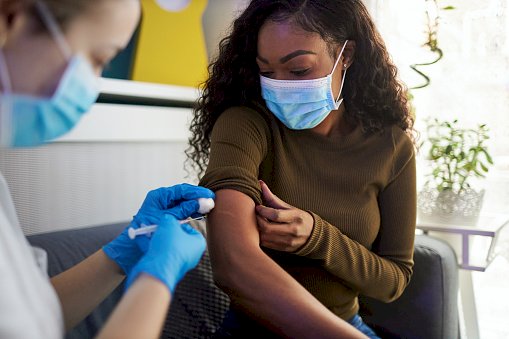 Black people less likely to have life-saving third jab, says report
